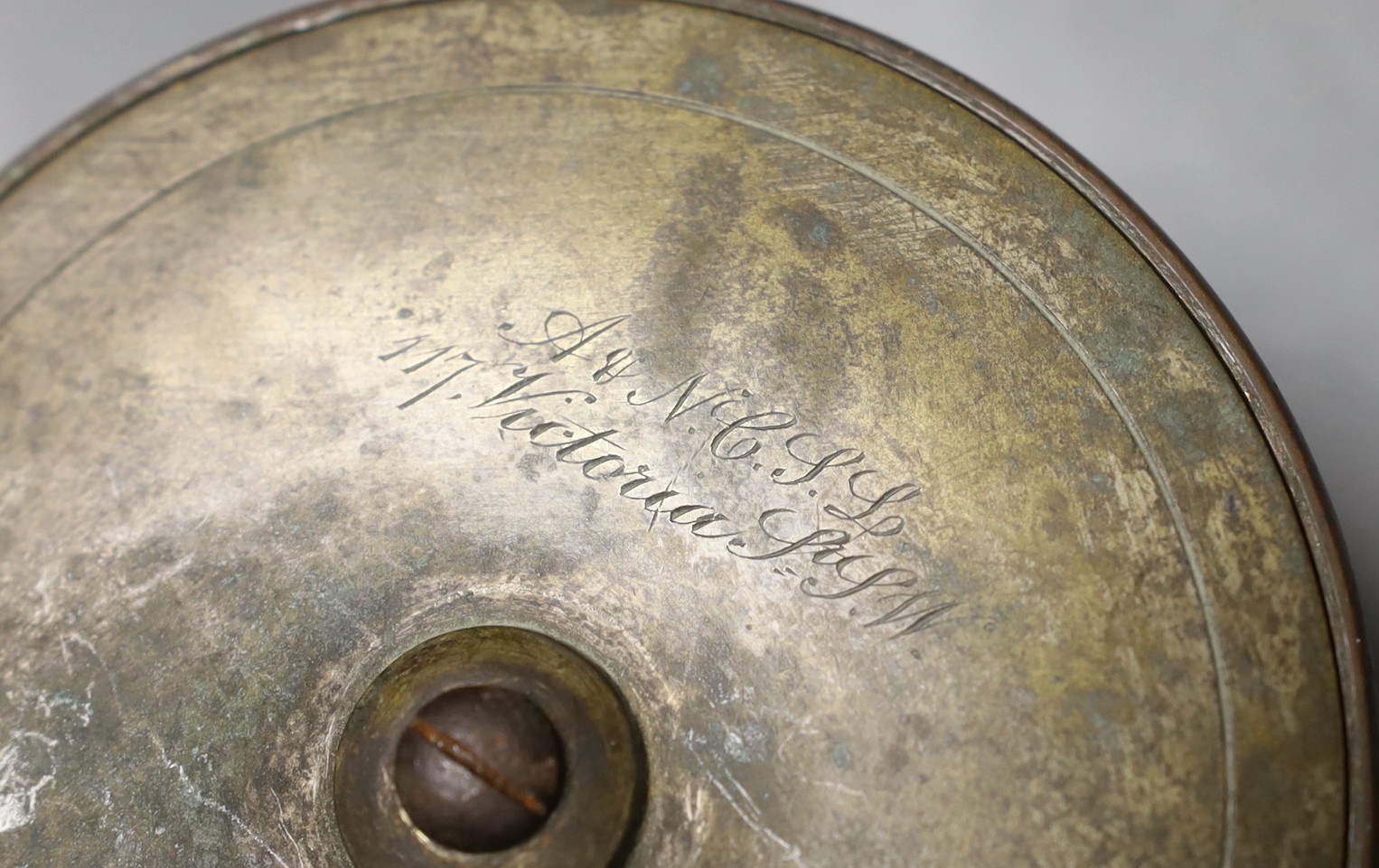 A vintage fishing reel, marked ‘A H N.C.S.L 117 Victoria S.S.W’